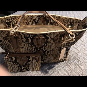 CoachEast West tire with wristlet